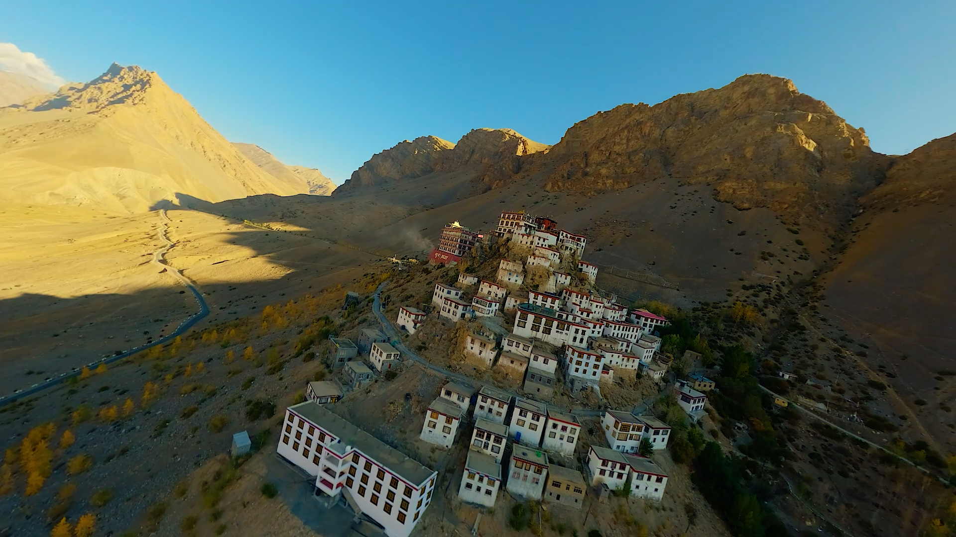 High-altitude FPV drone shot over a Himalayan monastery